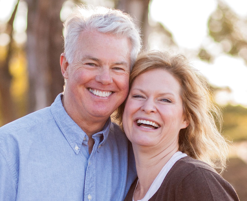 smiling couple implants from Channing Dental Berkeley, CA