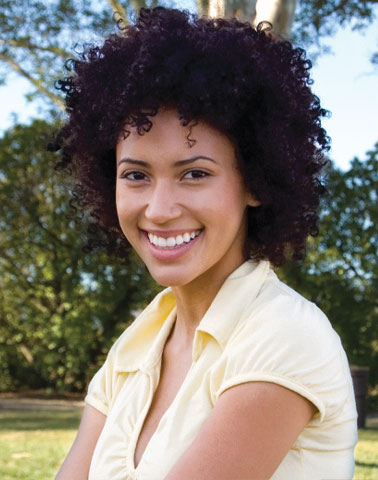 Woman smiling after dentist Channing Dental Berkeley, CA